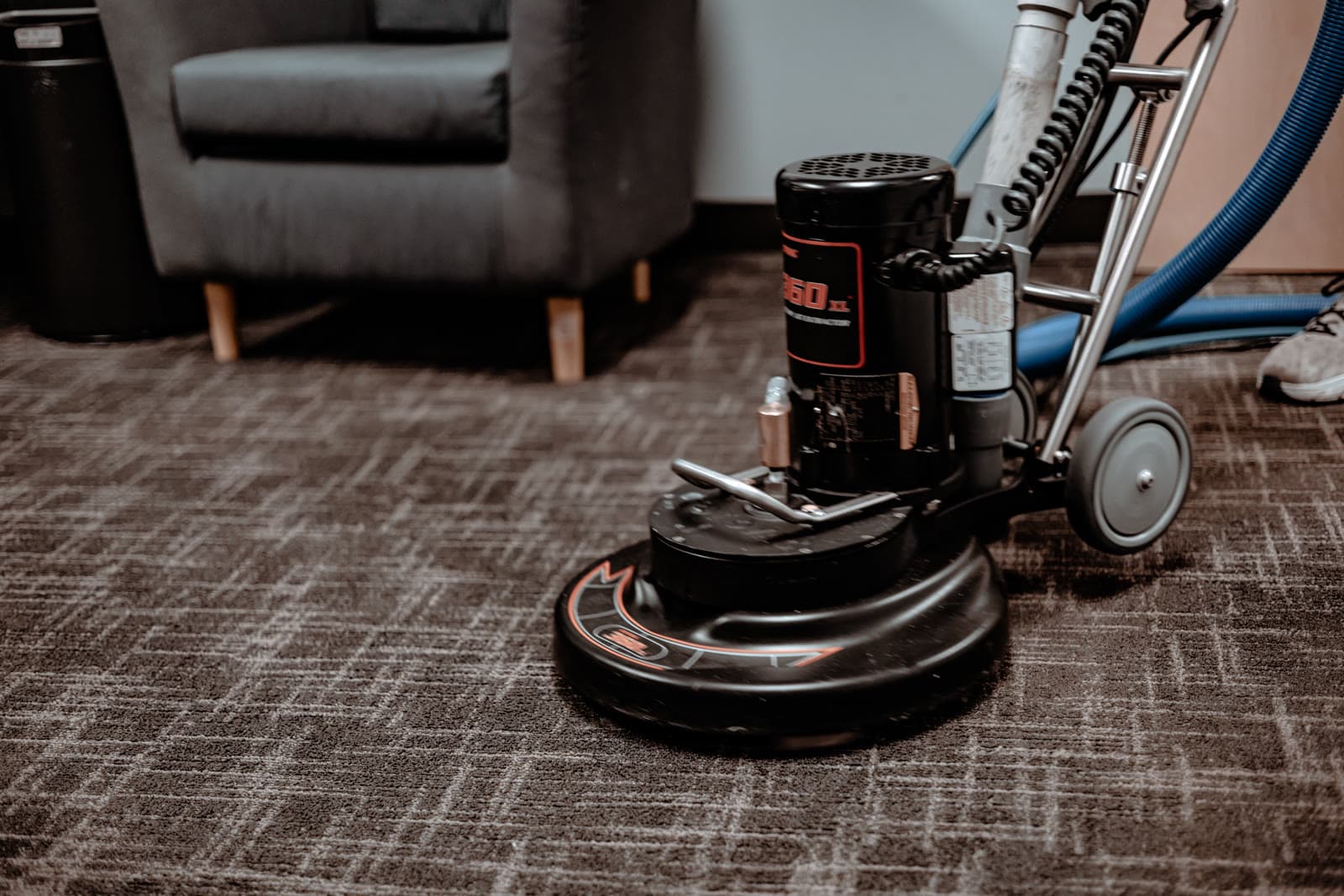 Commercial carpet extraction machine in use during IICRC-certified cleaning