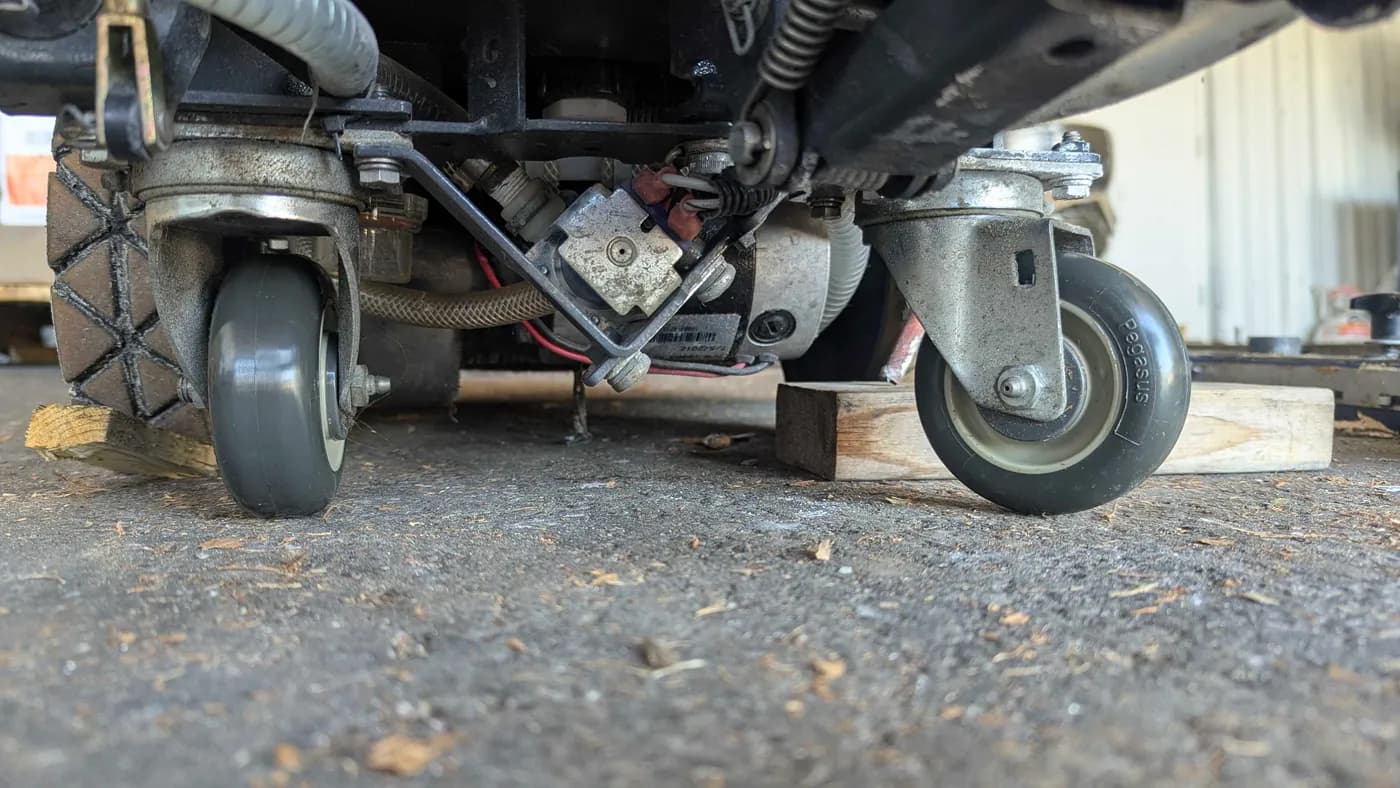 New caster wheel staged for replacement