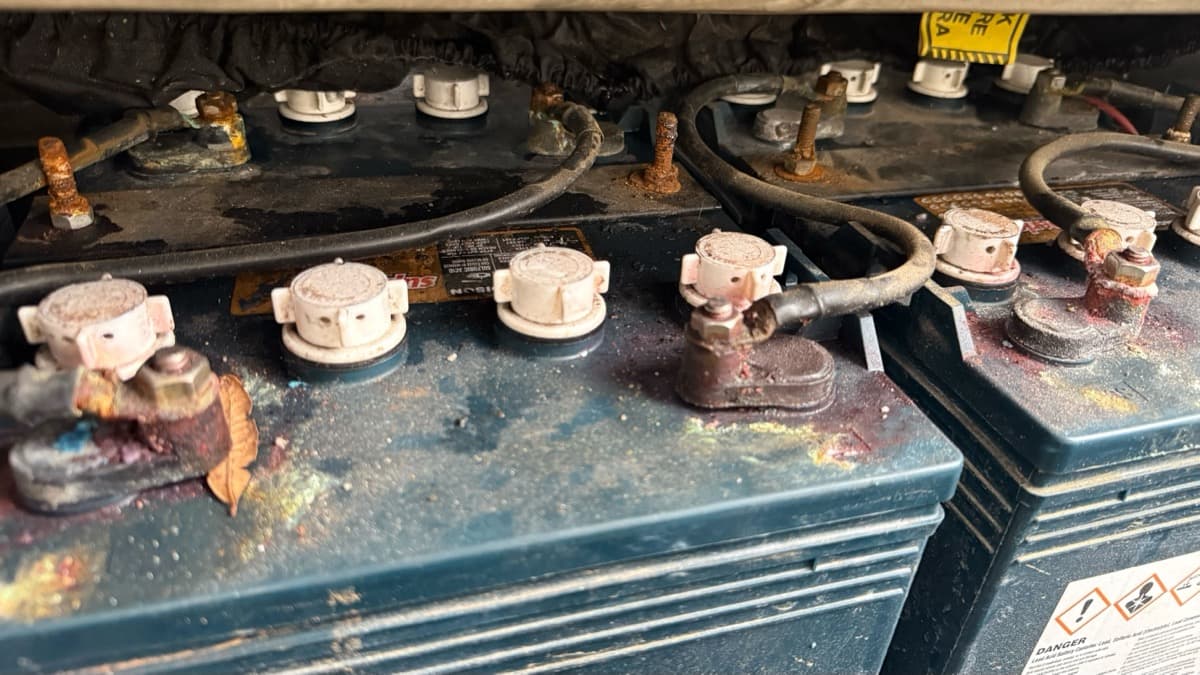 Floor scrubber battery bank inspection and terminal service