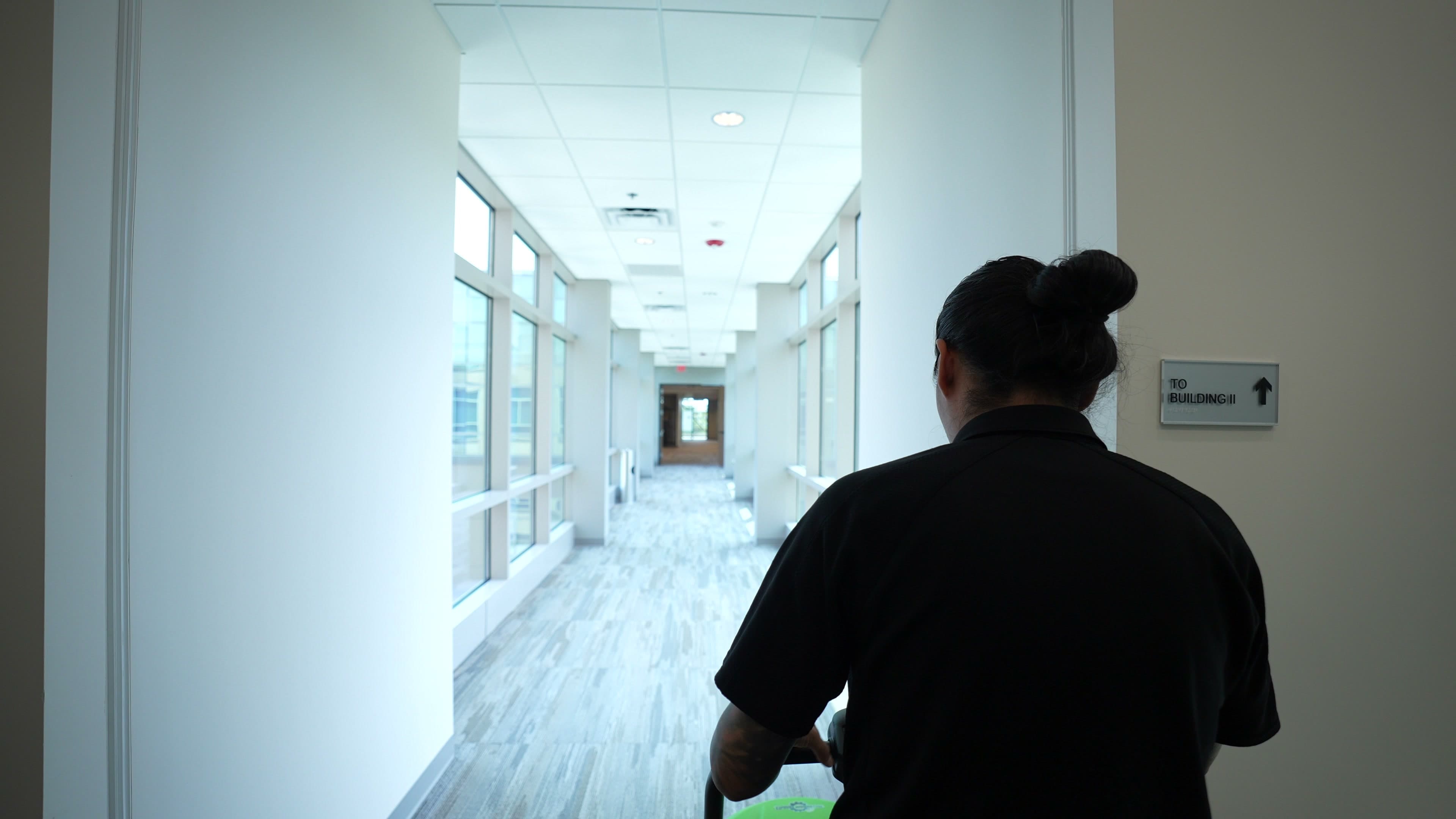 MFS team with equipment in facility hallway