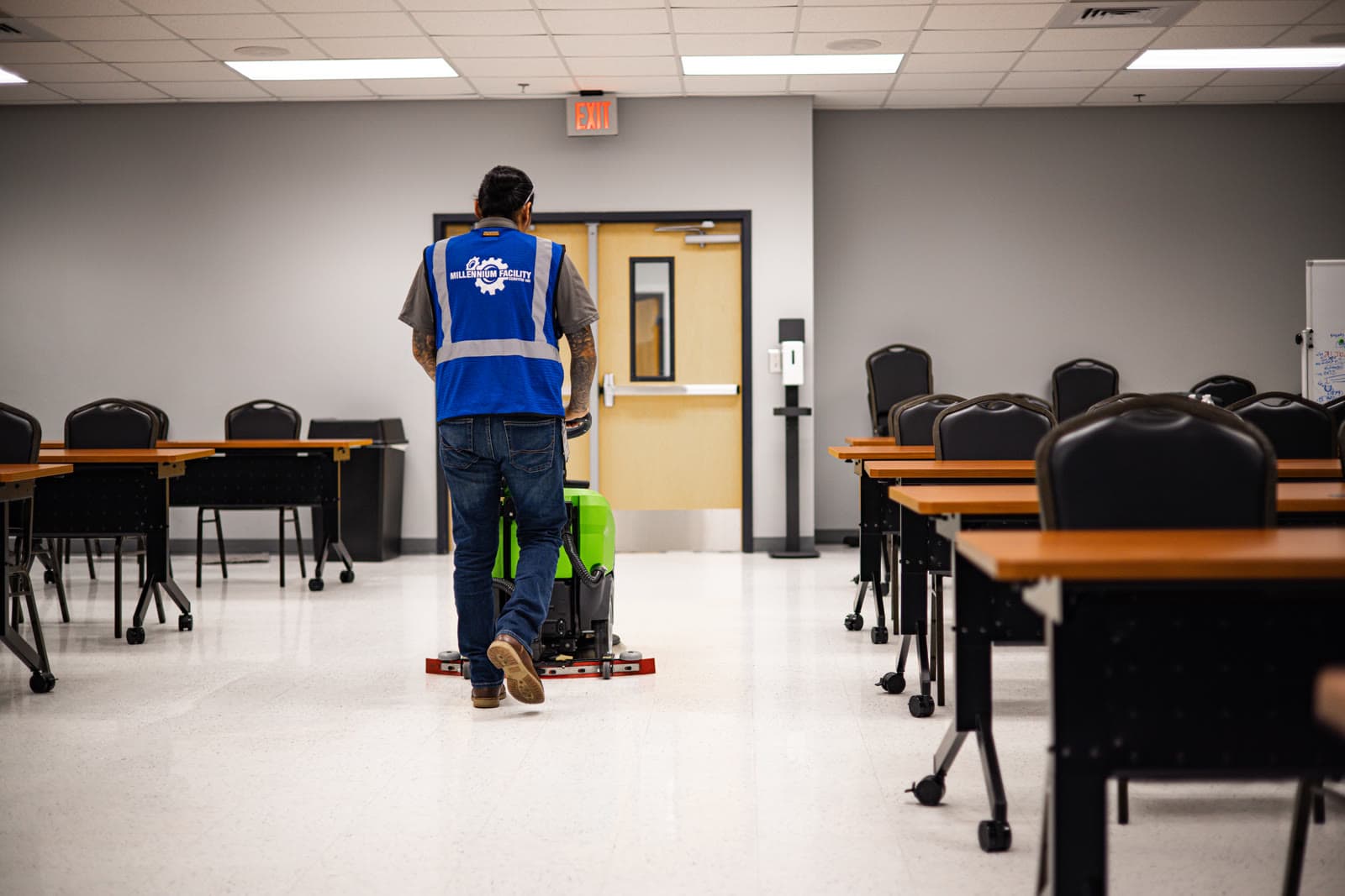 MFS technician operating floor machine in training room