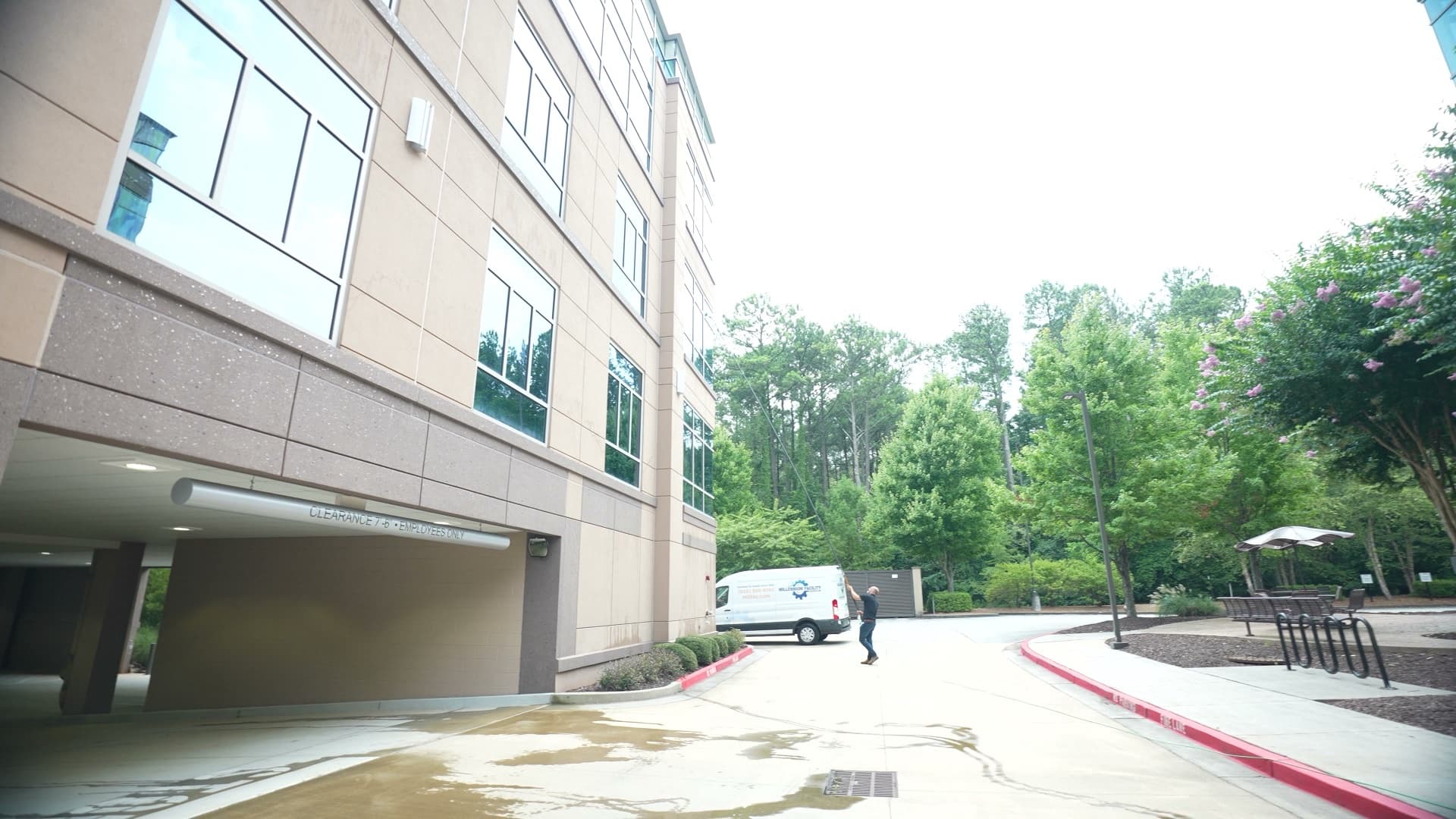 Millennium Facility Services van arriving at a corporate campus